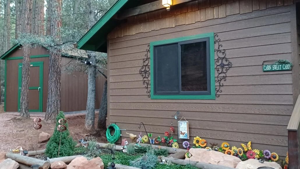 brown home and matching brown Tuff Shed